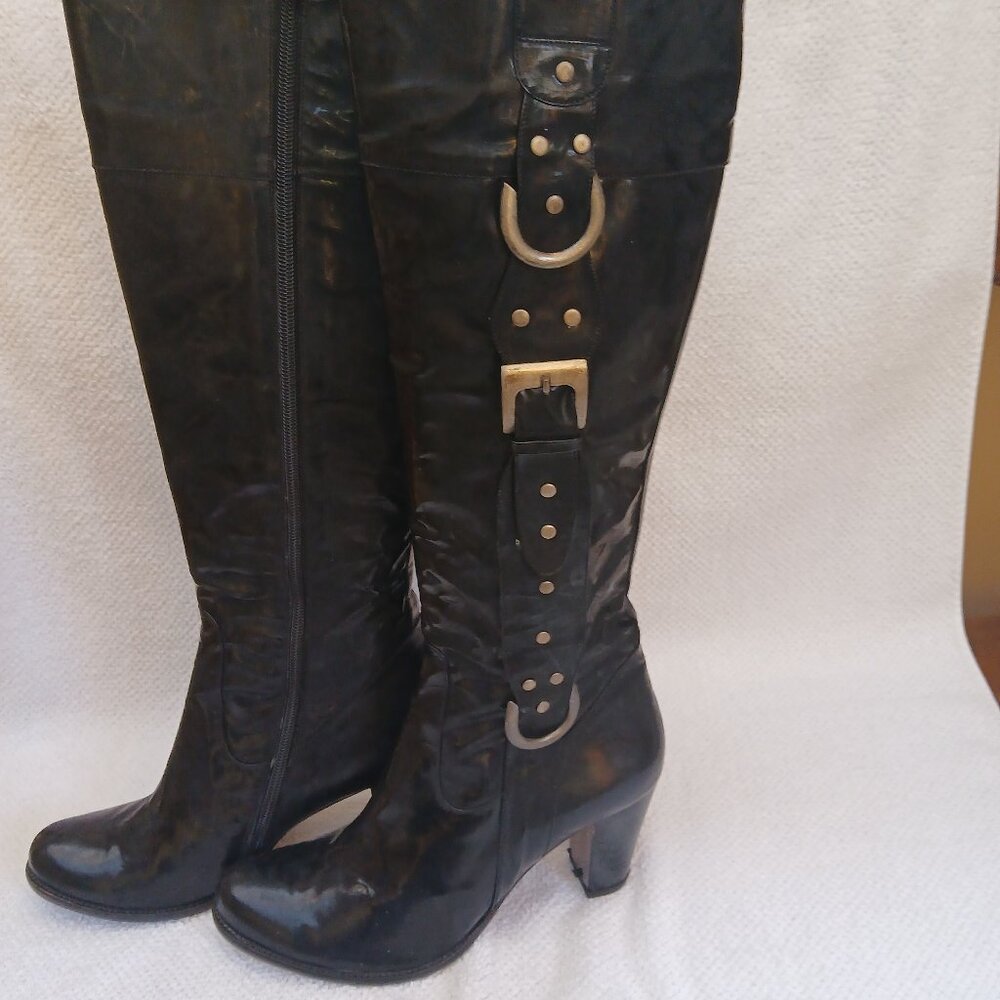Patent leather tall boots new and unworn.
